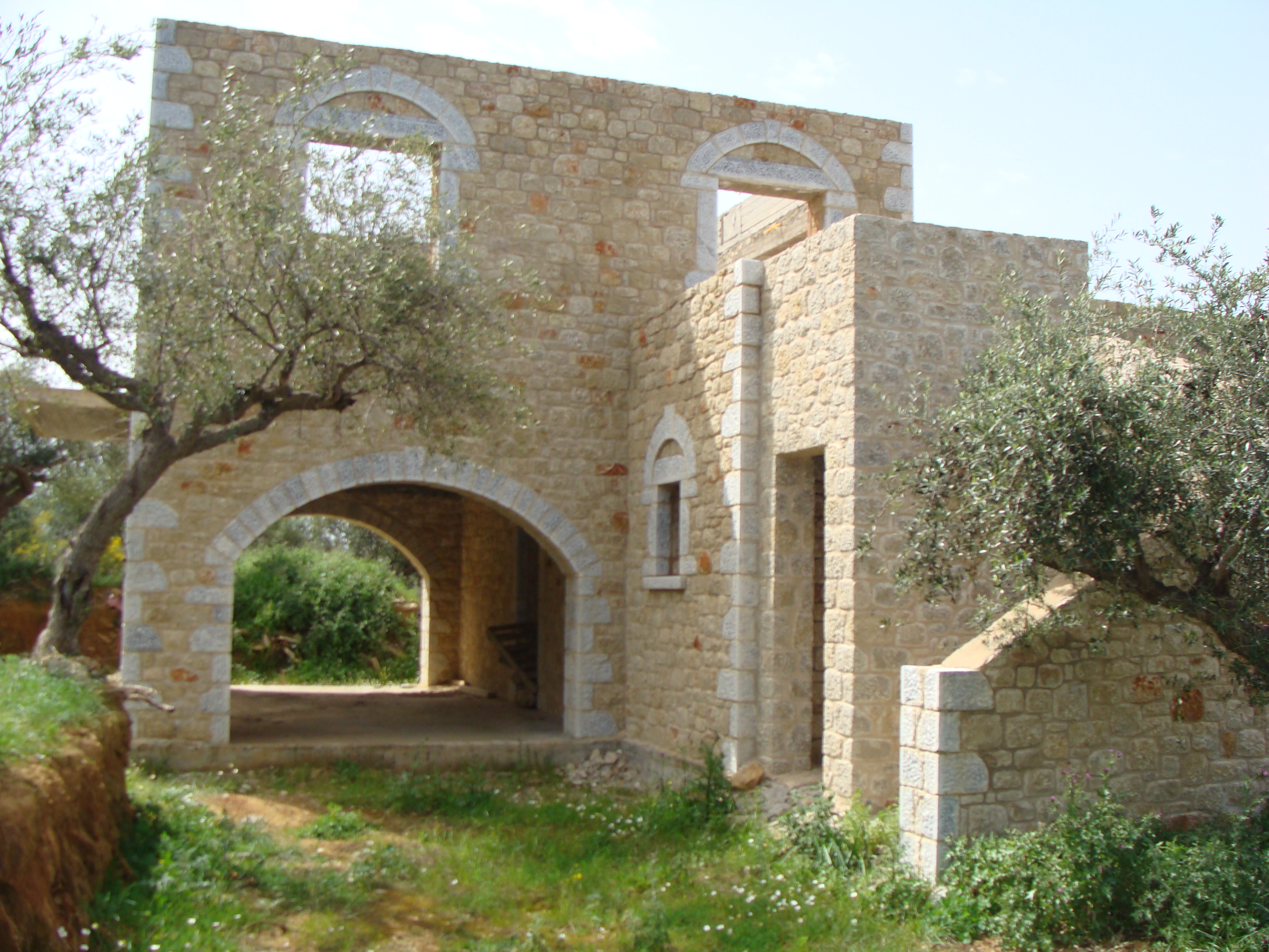 A two storey  stone house that has 120,39m2 total size. The property sits on a plot measuring 1264,63 m2