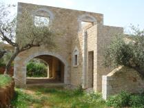 A two storey  stone house that has 120,39m2 total size. The property sits on a plot measuring 1264,63 m2